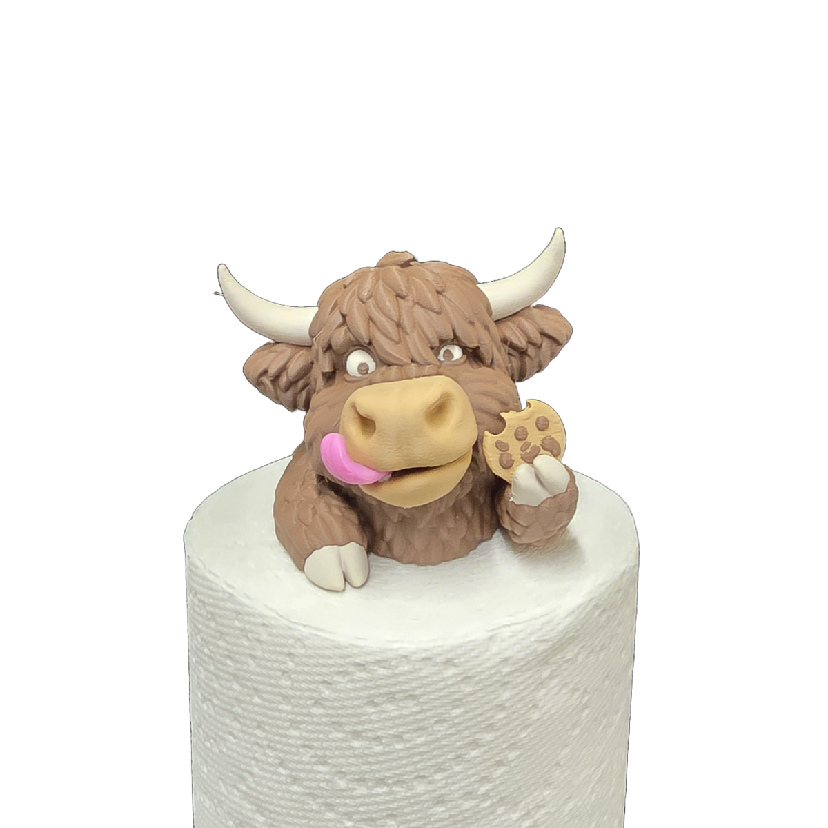 Compagnon du Rouleau Vache Highland, figurine décorative sur un rouleau de papier essuie-tout.